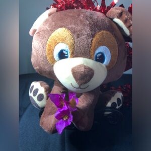 Brown Plush Bear with Purple Flower